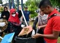 Gotong royong massal di gampong Ulee Lheue Banda Aceh. (Foto: Ist)