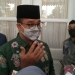 Gubernur DKI Jakarta Anies Baswedan diwawancarai media di Balai Kota Jakarta, Senin (20/12/2021). (ANTARA/Dewa Ketut Sudiarta Wiguna)