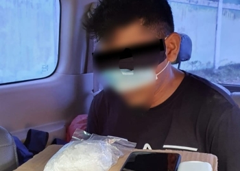 RM (32) kurir narkoba saat ditangkap Badan Narkotika Nasional Kabupaten (BNNK) bersama Satresnarkoba Polres Pidie (Dok. Ist).