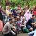 Para perwakilan delegasi G20 akrab bersama warga saat berkunjung ke Desa Genggelang, Kecamatan Gangga, Lombok Utara, Nusa Tenggara Barat. (ANTARA/HO-Polres Lotara)