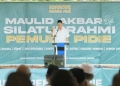 Pj. Gubernur Aceh, Achmad Marzuki, memberikan sambutan saat menghadiri Maulid Akbar dan Silaturahmi Pemuda Pidie di Gampong Pako Keumala, Pidie, Sabtu (19/11/2022). (Dok. Humas Aceh)