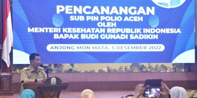 Pj. Gubernur Aceh, Achmad Marzuki, saat memberikan sambutan, pada kegiatan Pencanangan Sub PIN Polio yang dilakukan Oleh Menteri Kesehatan RI, Budi Gunadi Sadikin, di Anjong Mon Mata, Banda Aceh, Senin (5/12/2022). (Dok. Humas Pemerintah Aceh)