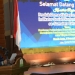 Asisten Administrasi Umum Sekda Aceh, Iskandar, menyampaikan sambutan Pj Gubernur Aceh, pada acara pembukaan Konsultasi Regional Produk Domestik Regional Bruto Dan Indikator Sosial Ekonomi (PDRB-ISE) Se-Sumatera Tahun 2022, di Anjong Mon Mata, Banda Aceh, Rabu (7/12/2022). (Dok. Humas Pemerintah Aceh)