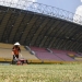 Petugas melakukan perawatan rumput di Stadion Glora Sriwijaya, Jakabaring, Palembang, Sumatera Selatan (ANTARA/M Riezko Bima Elko P)