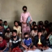Sejumlah anak-anak pengungsi etnis Rohingya yang terdampar di Aceh Besar saat berada di tempat penampungan sementara di UPTD Dinas Sosial Aceh Ladong, Aceh Besar, Aceh, Minggu (8/1/2023). (Foto: Antara/Irwansyah Putra)