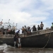 Kapal membawa pengungsi Rohingya saat terdampar di Pantai Lampanah Leungah Aceh Besar, Kamis (16/2/2023). ANTARA FOTO/Ampelsa