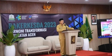 Asisten Pemerintahan, Keistimewaan Aceh dan Kesejahteraan Rakyat Sekda Aceh, M. Jafar saat menyampaikan sambutan pada pembukaan Rapat Kerja Kesehatan Daerah (Rakerkesda) 2023 di Aula Bapelkes Aceh, Banda Aceh, Senin (13/3/2023). (Dok. Humas Pemerintah Aceh)