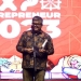 Sekda Aceh Bustami, saat menyampaikan sambutan dan menutup secara resmi Expo Enterpreneur 2023, di Lapangan Blang Padang, Banda Aceh, Senin (13/3/2023) malam. (Dok. Humas Pemerintah Aceh)
