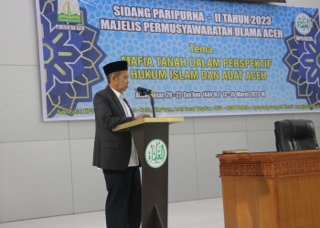 Plt. Kepala Sekretariat MPU Aceh Zulkarnaini, membacakan Draf Fatwa MPU Aceh tentang Mafia Tanah dalam Perspektif Hukum Islam dan Adat Aceh. (Foto: ALIBI/Dok. MPU Aceh)