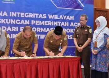 Penandatanganan komitmen Pencanangan Zona Integritas Wilayah Bebas Korupsi di Lingkungan Pemerintah Aceh, di Hermes Palace Hotel, Banda Aceh, Selasa (4/4/2023). (Foto: Alibi/Dok. Humas Pemerintah Aceh)