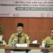 Asisten Administrasi Umum Sekda Aceh,  Iskandar, saat membuka Rapat Koordinasi Bidang Kepegawaian Netralitas ASN Jelang Pemilu 2024, Banda Aceh, Selasa (23/5/2023). (Foto: Alibi/Dok. Humas Pemerintah Aceh)