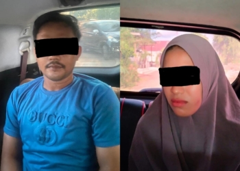 Polisi menangkap pasangan suami istri pelaku pembuang bayi di Aceh Besar. (Foto: Alibi/Dok. Polresta Banda Aceh)