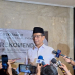 Cawapres Mahfud MD saat menjawab pertanyaan wartawan usai menghadiri Musyawarah Kerja Nasional Majelis Ulama Indonesia di Jakarta Utara, Jumat (1/12/2023). (Foto: Antara/ Fianda Sjofjan Rassat)